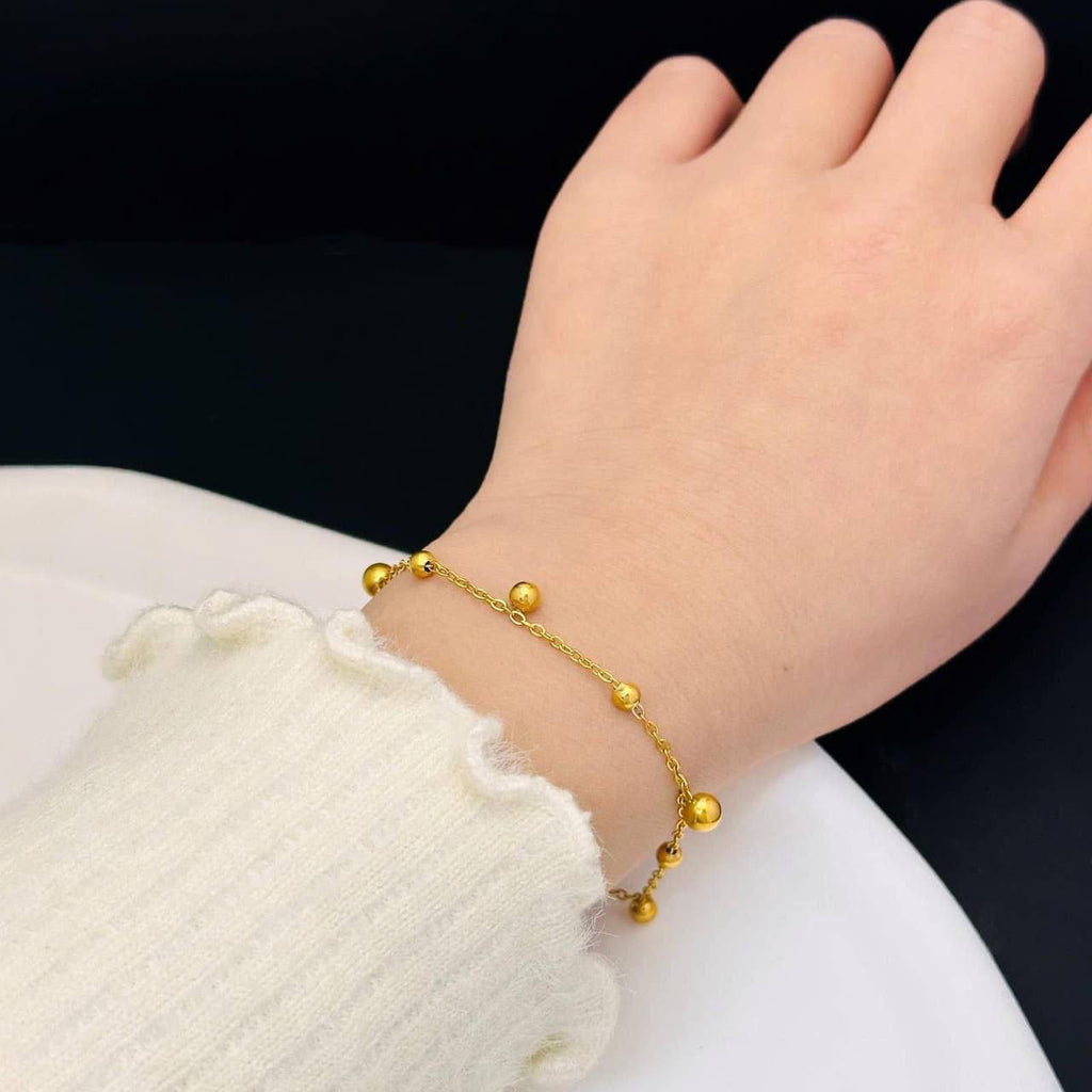 إسوارة "الكرات الذهبية" المتدلية | Dainty Golden Beads Bracelet