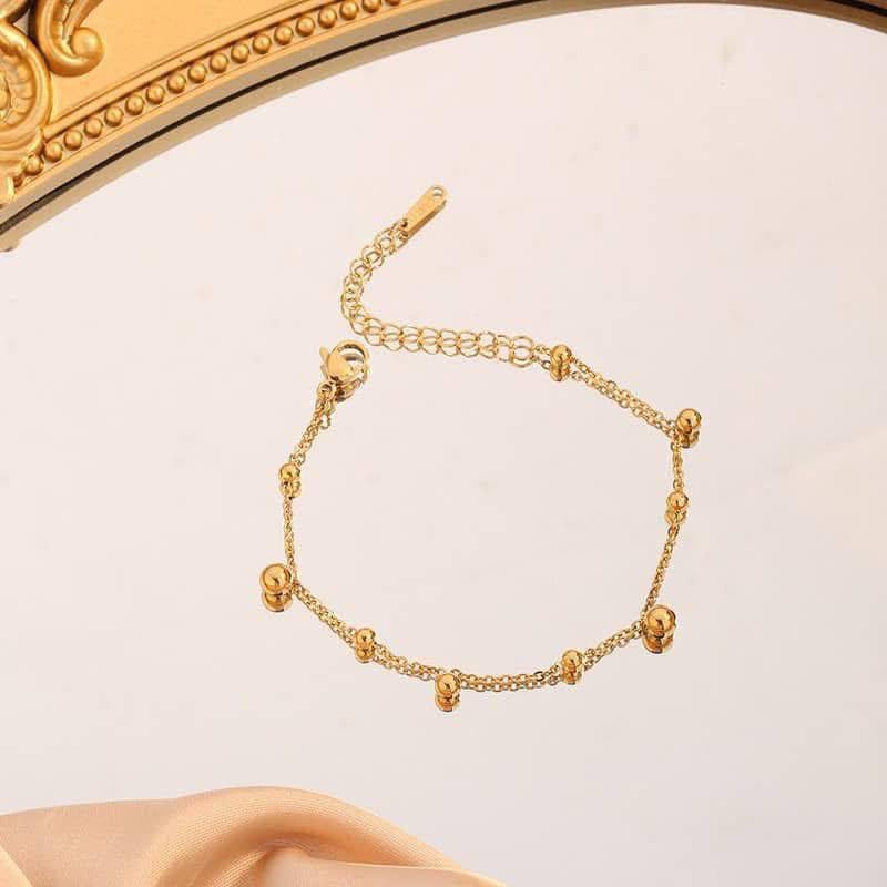 إسوارة "الكرات الذهبية" المتدلية | Dainty Golden Beads Bracelet