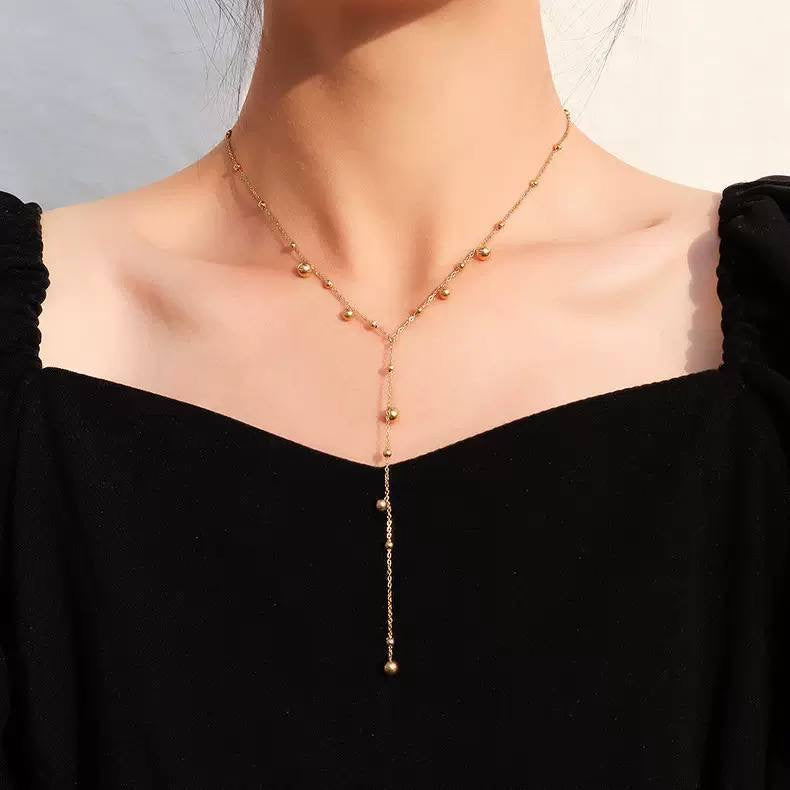 قلادة "حبات اللؤلؤ الذهبي" المتدلية | Golden Beads Drop Necklace