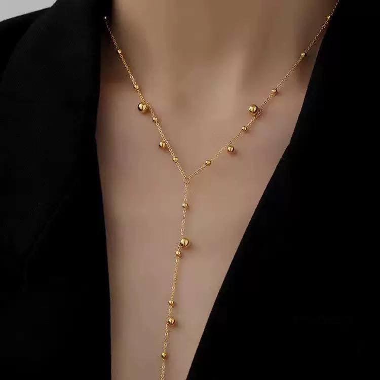 قلادة "حبات اللؤلؤ الذهبي" المتدلية | Golden Beads Drop Necklace